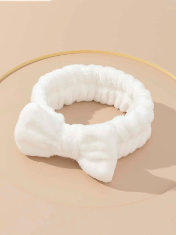 Serre-tête de bain décoré d'un nœud