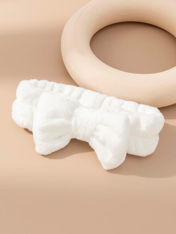 Serre-tête de bain décoré d'un nœud